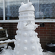 Illustration for article titled These geeky snowmen turn their yards into a weirder winter wonderland